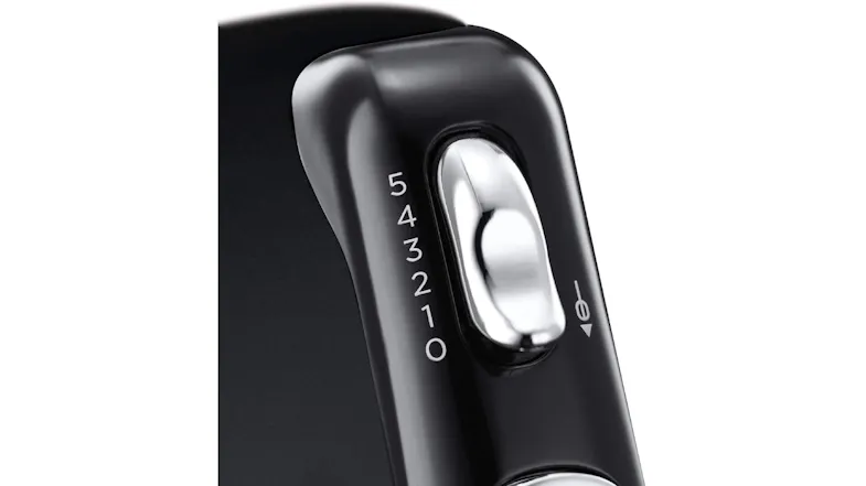 Close-up of the speed control slider on the hand mixer, showing settings from 0 to 5 Close-up of the speed control slider on the hand mixer, showing settings from 0 to 5