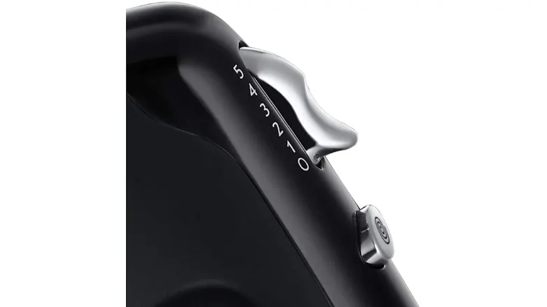 Macro view of the matte black mixer handle featuring the silver turbo boost and speed buttons Macro view of the matte black mixer handle featuring the silver turbo boost and speed buttons