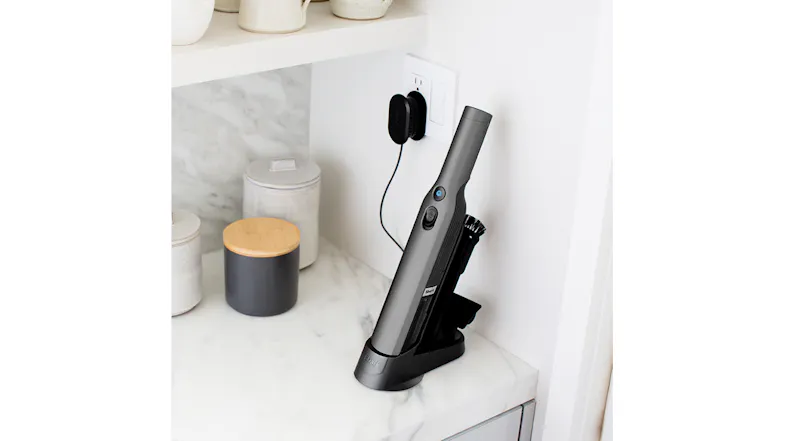 The unit being charged while positioned on a kitchen countertop The unit being charged while positioned on a kitchen countertop