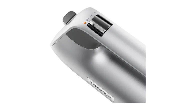 Close-up of the handheld mixer’s top controls, showing the speed slider and turbo button Close-up of the handheld mixer’s top controls, showing the speed slider and turbo button