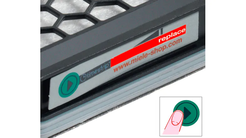 Close-up of the filter’s Timestrip showing the "replace" indicator and activation button Close-up of the filter’s Timestrip showing the "replace" indicator and activation button
