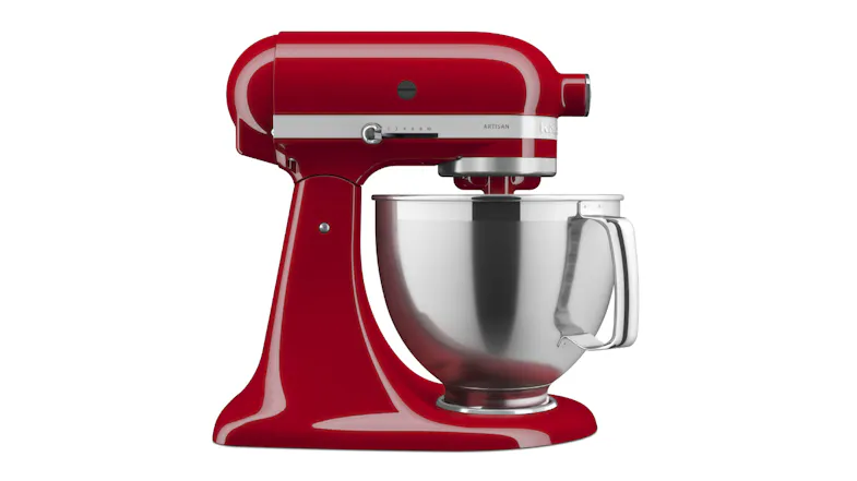 Side view of the KitchenAid Artisan stand mixer in Empire Red, showing the stainless steel mixing bowl with handle Side view of the KitchenAid Artisan stand mixer in Empire Red, showing the stainless steel mixing bowl with handle