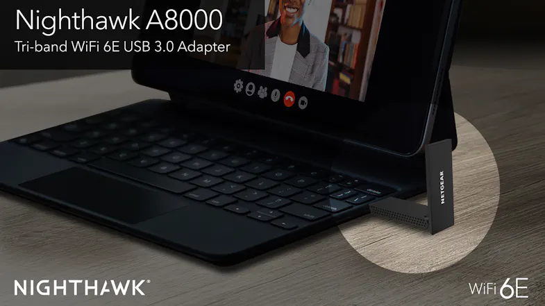 A Nighthawk A8000 Tri-band adapter plugged into a laptop on a video call. A Nighthawk A8000 Tri-band adapter plugged into a laptop on a video call.