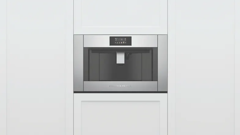 A stainless steel automatic coffee machine is installed in the kitchen. A stainless steel automatic coffee machine is installed in the kitchen.