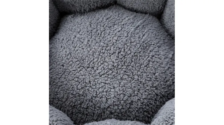 Close-up of a fleece pet bed interior showing soft, textured plush cushioning Close-up of a fleece pet bed interior showing soft, textured plush cushioning