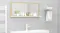 A view of the mirror mounted on a wall A view of the mirror mounted on a wall