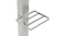 Close-up of a stainless steel slatted shelf attached to a garden water column Close-up of a stainless steel slatted shelf attached to a garden water column