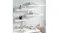 A grey wall with a wall-mounted shelf holding decor A grey wall with a wall-mounted shelf holding decor
