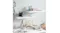 A grey wall with a wall-mounted shelf holding decor A grey wall with a wall-mounted shelf holding decor