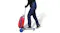 A person riding the scooter with the attached red luggage trolley, pushing forward on the blue handle A person riding the scooter with the attached red luggage trolley, pushing forward on the blue handle