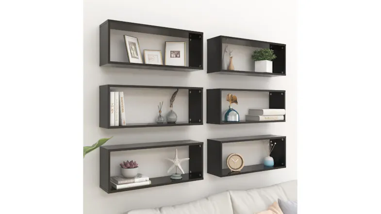 A set of six NNEVL floating shelves mounted on the wall with decor items in an indoor setup A set of six NNEVL floating shelves mounted on the wall with decor items in an indoor setup