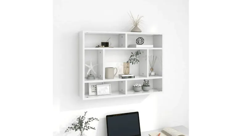 A gloss white floating display shelf used as office storage in a bright, modern room A gloss white floating display shelf used as office storage in a bright, modern room