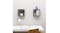 Two gloss grey cube wall shelves mounted above a desk, each holding small decor items Two gloss grey cube wall shelves mounted above a desk, each holding small decor items