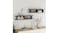 Styled living room scene with two floating ladder shelves mounted on a wall above a sideboard Styled living room scene with two floating ladder shelves mounted on a wall above a sideboard