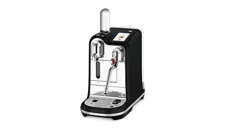Black and silver Nespresso coffee machine with dual spouts, drip tray, and digital display Black and silver Nespresso coffee machine with dual spouts, drip tray, and digital display