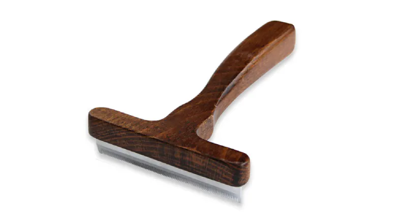 A large Maximilian Undercoat Deshedding Tool with a wooden handle, featuring a wide T‑shaped head and fine metal comb teeth A large Maximilian Undercoat Deshedding Tool with a wooden handle, featuring a wide T‑shaped head and fine metal comb teeth