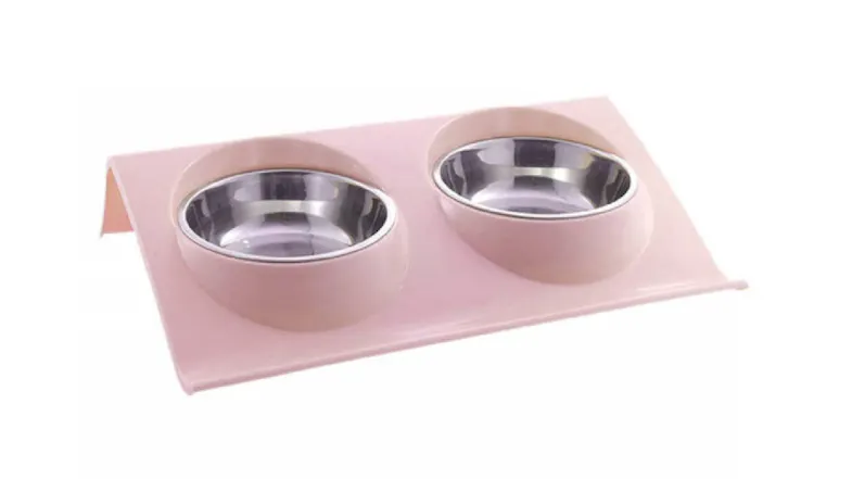 A left-angled view of the Fluff n' Stuff Dual Anti-Spill Bowls for Dogs & Cats in pink finish A left-angled view of the Fluff n' Stuff Dual Anti-Spill Bowls for Dogs & Cats in pink finish