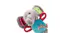 Close-up of plush elephant dog toy with patterned ears and bright fabric handles Close-up of plush elephant dog toy with patterned ears and bright fabric handles