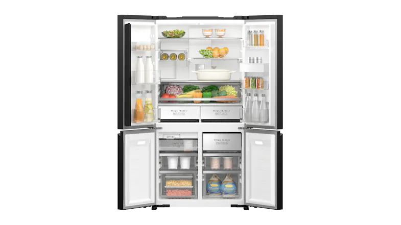 An open quad door smart fridge freezer stocked with food and drinks An open quad door smart fridge freezer stocked with food and drinks