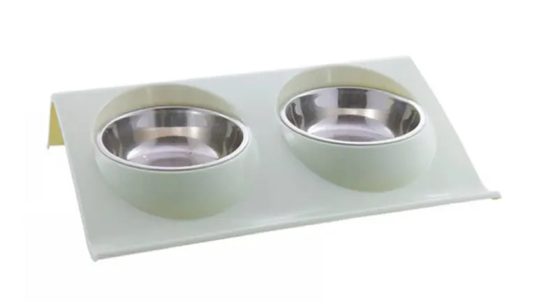 A left-angled view of the Fluff n' Stuff Dual Anti-Spill Bowls for Dogs & Cats in Green finish A left-angled view of the Fluff n' Stuff Dual Anti-Spill Bowls for Dogs & Cats in Green finish