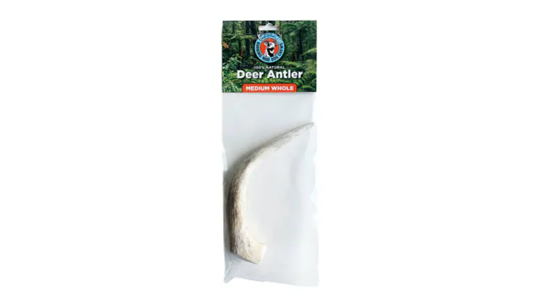 A deer antler chew on its retail packaging A deer antler chew on its retail packaging
