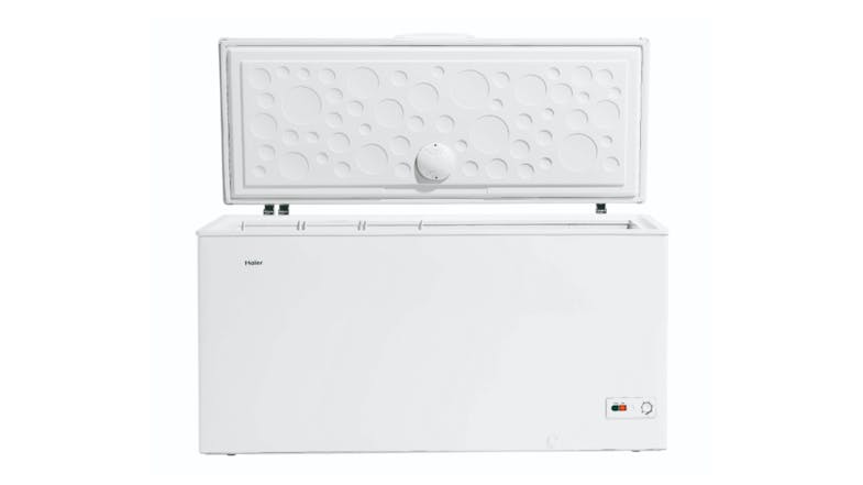 Front view of an open Haier 300 Series 519L Chest Freezer showing the white interior and lid Front view of an open Haier 300 Series 519L Chest Freezer showing the white interior and lid
