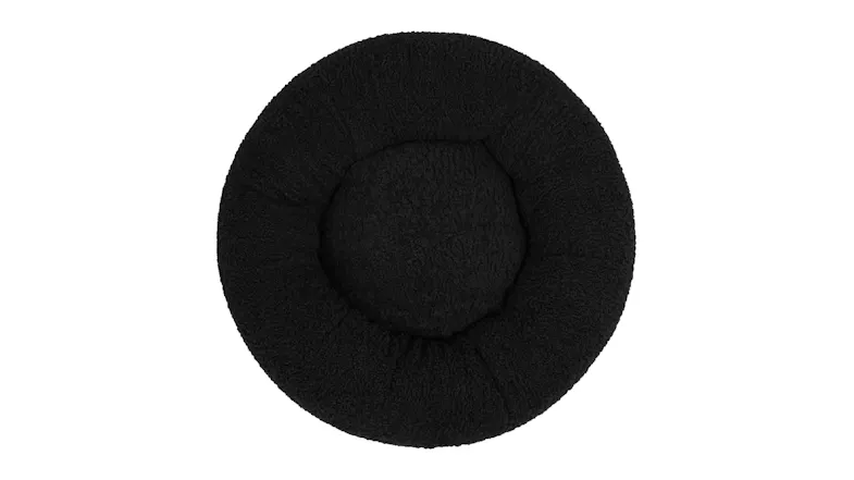 Top view of a round pet bed with a padded centre and raised circular sides Top view of a round pet bed with a padded centre and raised circular sides