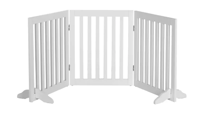 The white three-panel pet gate was displayed fully opened in a wide V-shape The white three-panel pet gate was displayed fully opened in a wide V-shape
