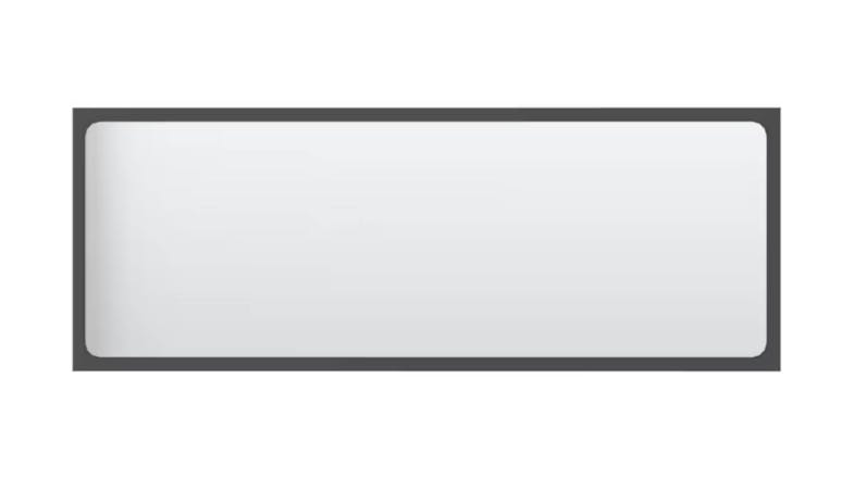 A rectangle-shaped bathroom mirror, framed in a slim grey border A rectangle-shaped bathroom mirror, framed in a slim grey border