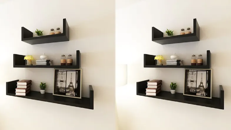 A side-by-side comparison of three black U-shaped floating shelves styled with books, plants, and décor on a wall A side-by-side comparison of three black U-shaped floating shelves styled with books, plants, and décor on a wall