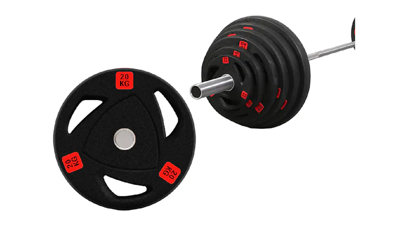 A black 20 kg weight plate sits beside a barbell loaded with multiple black and red weight plates A black 20 kg weight plate sits beside a barbell loaded with multiple black and red weight plates