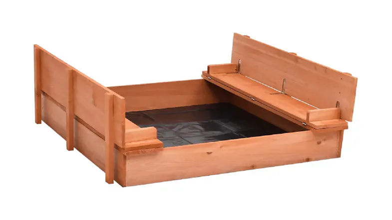 The sandbox with its wooden lid folded open into two bench seats, revealing a black ground liner inside. The sandbox with its wooden lid folded open into two bench seats, revealing a black ground liner inside.