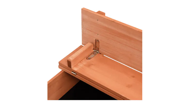 A close‑up of the interior bench hinge connection showing the wooden seat plank attached to the upright support. A close‑up of the interior bench hinge connection showing the wooden seat plank attached to the upright support.