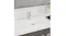 The white rectangular ceramic basin installed in a modern bathroom vanity, with a chrome faucet The white rectangular ceramic basin installed in a modern bathroom vanity, with a chrome faucet