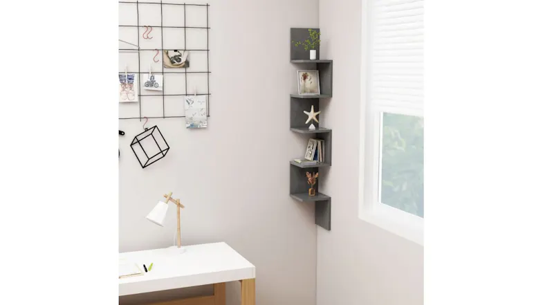 Corner shelf with decor mounted near a window Corner shelf with decor mounted near a window