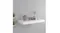 Single mounted white floating shelf installed on a wall, holding decorative items and books Single mounted white floating shelf installed on a wall, holding decorative items and books