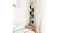 Modern corner wall shelf styled with books and vases in a bedroom Modern corner wall shelf styled with books and vases in a bedroom