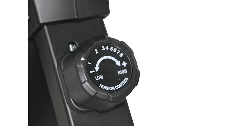A close-up view of a black plastic adjustable tension control knob showing levels numbered 1 through 8 A close-up view of a black plastic adjustable tension control knob showing levels numbered 1 through 8