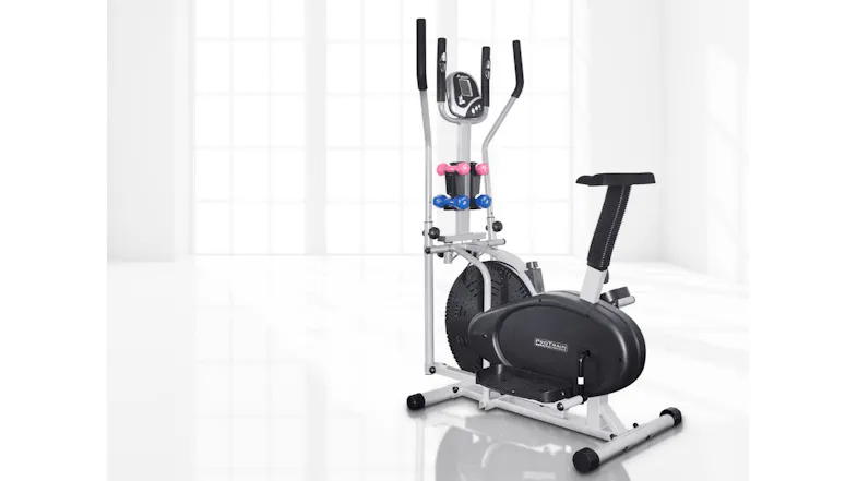 An elliptical bike with a seat and small weights displayed in a bright room with a large window backdrop An elliptical bike with a seat and small weights displayed in a bright room with a large window backdrop