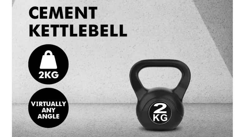 A marketing graphic featuring the black 2kg kettlebell on a light grey concrete floor A marketing graphic featuring the black 2kg kettlebell on a light grey concrete floor