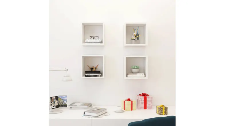 A set of four NNEVL floating shelves mounted on the wall with decor items A set of four NNEVL floating shelves mounted on the wall with decor items