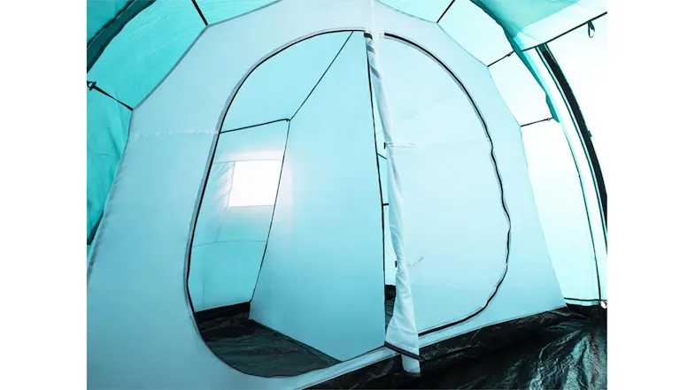 Interior of a family camping tent with a partitioned room, a mesh window, and a spacious floor area Interior of a family camping tent with a partitioned room, a mesh window, and a spacious floor area