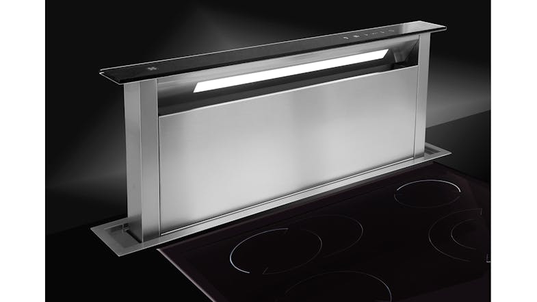 Downdraft rangehood extended from a black glass cooktop, with subtle lighting and airflow visible Downdraft rangehood extended from a black glass cooktop, with subtle lighting and airflow visible