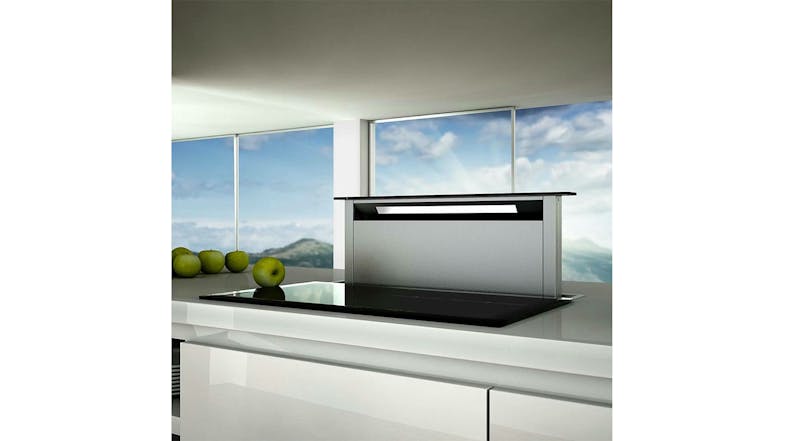 The Sirius downdraft rangehood installed in a contemporary kitchen island, rising behind the cooktop The Sirius downdraft rangehood installed in a contemporary kitchen island, rising behind the cooktop