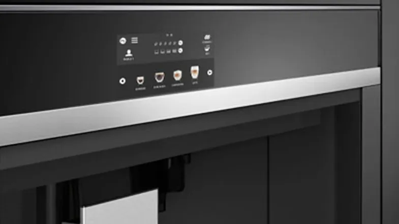 Side view of the coffee machine’s control panel with a modern, sleek design. Side view of the coffee machine’s control panel with a modern, sleek design.