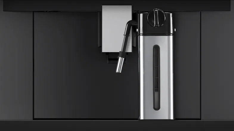 An automatic coffee machine is installed in the kitchen. An automatic coffee machine is installed in the kitchen.