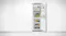 A view of the fridge installed flush on a clean white wall A view of the fridge installed flush on a clean white wall