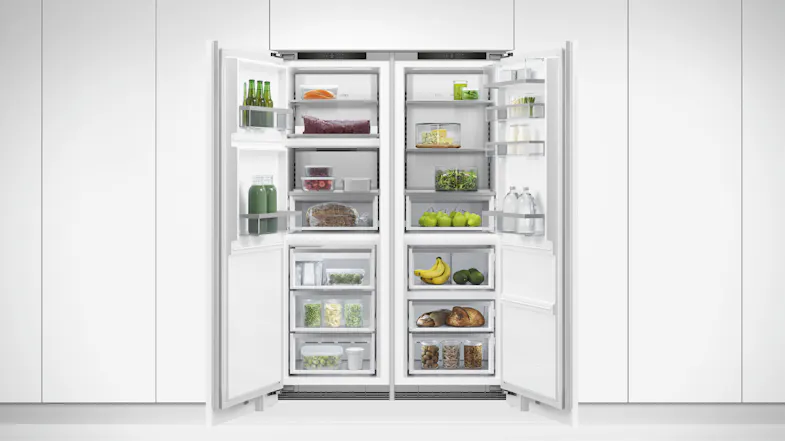 A view of the fridge and its compatible freezer with both doors opened A view of the fridge and its compatible freezer with both doors opened
