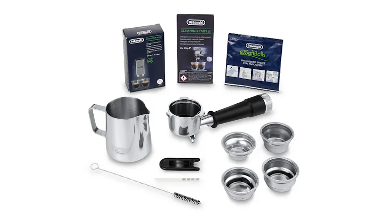 A set of espresso machine accessories, including a portafilter, filter baskets, milk pitcher, brushes, and a cleaning kit A set of espresso machine accessories, including a portafilter, filter baskets, milk pitcher, brushes, and a cleaning kit