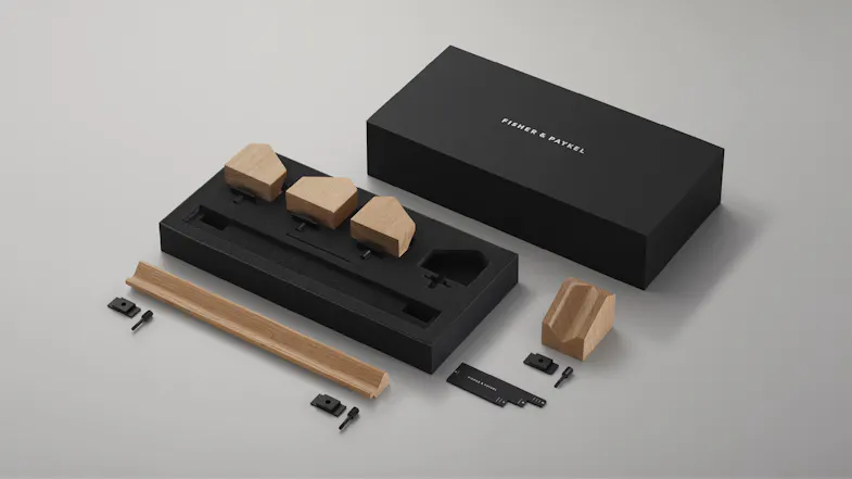 Fisher & Paykel accessory kit with wooden components, screws, and black packaging for wine fridge customisation Fisher & Paykel accessory kit with wooden components, screws, and black packaging for wine fridge customisation
